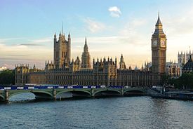 The Palace of Westminster with Elizabeth Tower and Westminster Bridge viewed from across the River Thames